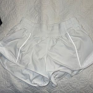 white reflective lulu shorts